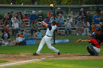 Osceola Braves swinging a bat